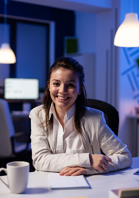 Close up portrait of business woman smiling at camera